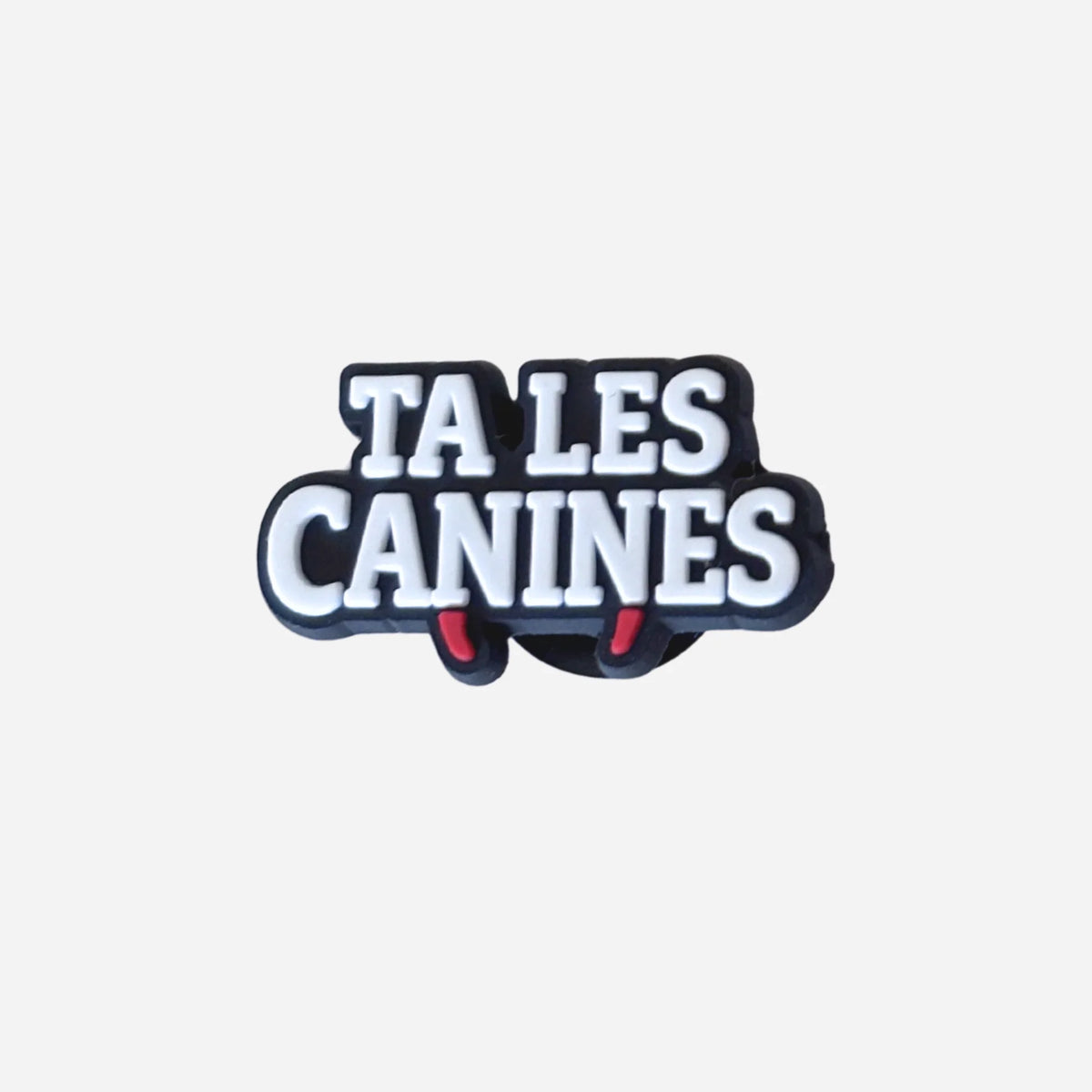 Pin's punchline Ta les canines lettrage blanc et crocs rouges pour Crocs